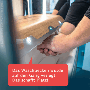 Bild 2 von 4 Eine Person wascht sich in einem modernen Zug ihre Hände