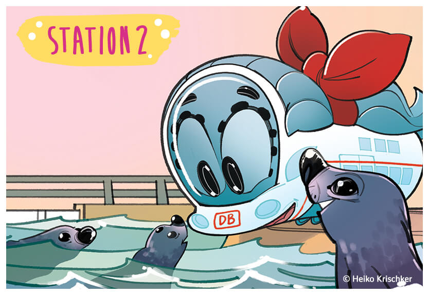 Station 2: Ida schaut begeistert auf die Seehunde im Wasser.